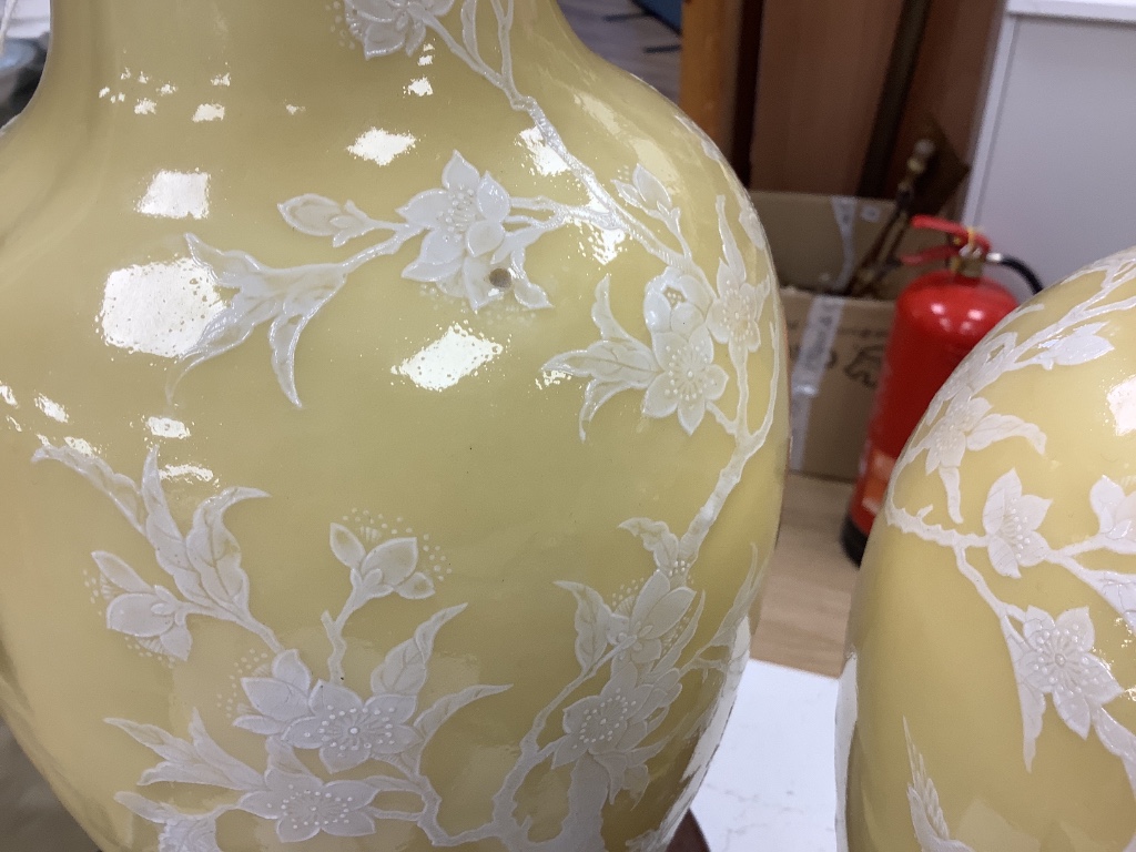 A pair of Chinese yellow ground table lamps, height 38cm not including electric fitting